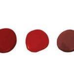 Three red circles on a white background.