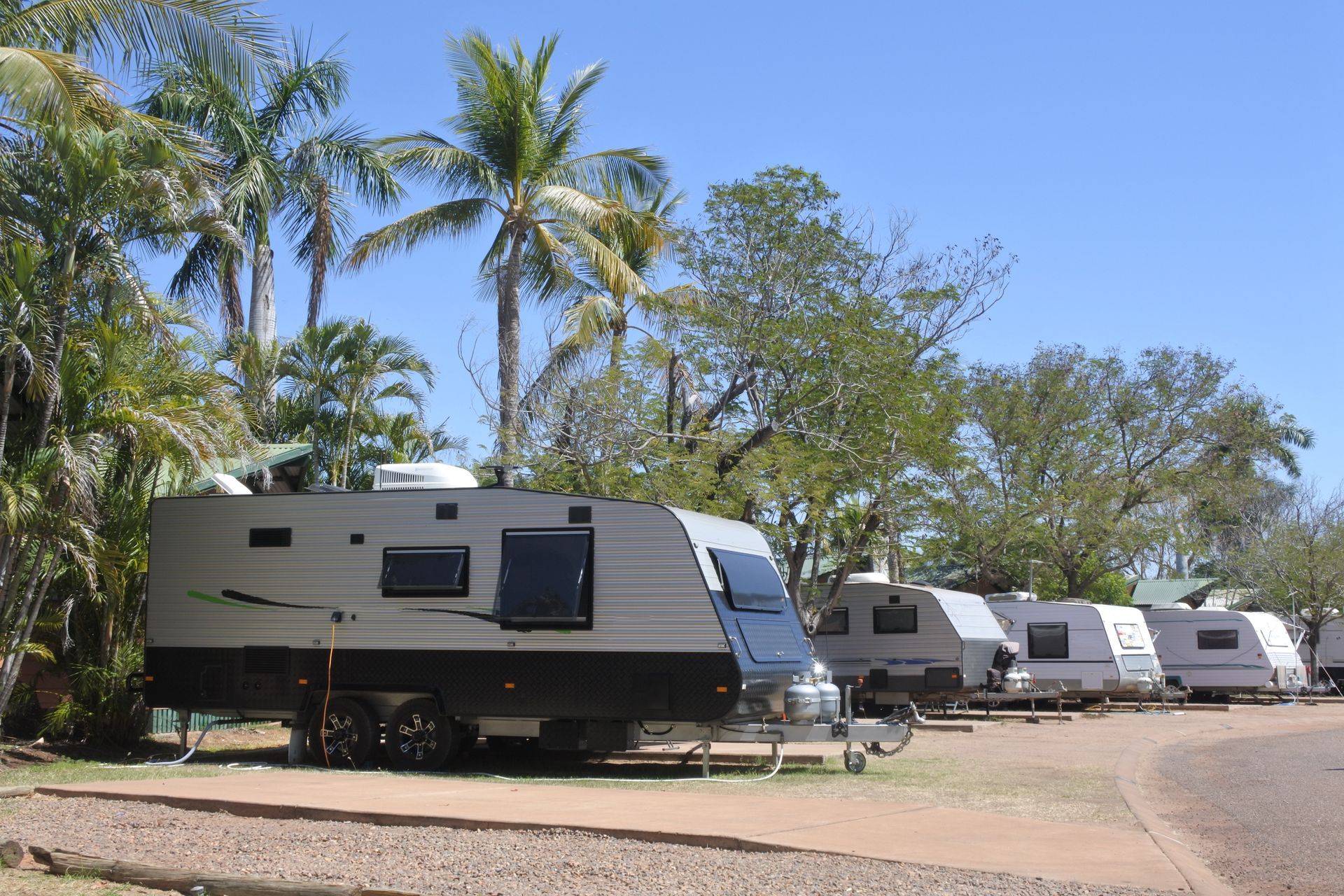 A White RV Is Parked On The Side Of The Road – North Geelong, VIC - F Sparks & Sons