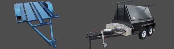 Two trailers: a blue open trailer and a black enclosed trailer.