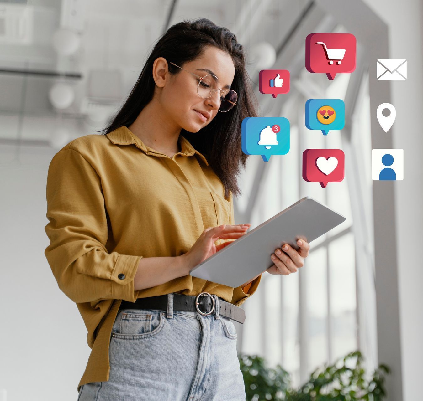 Mulher com camisa mostarda usando um tablet, com ícones de notificação de redes sociais flutuando por perto.