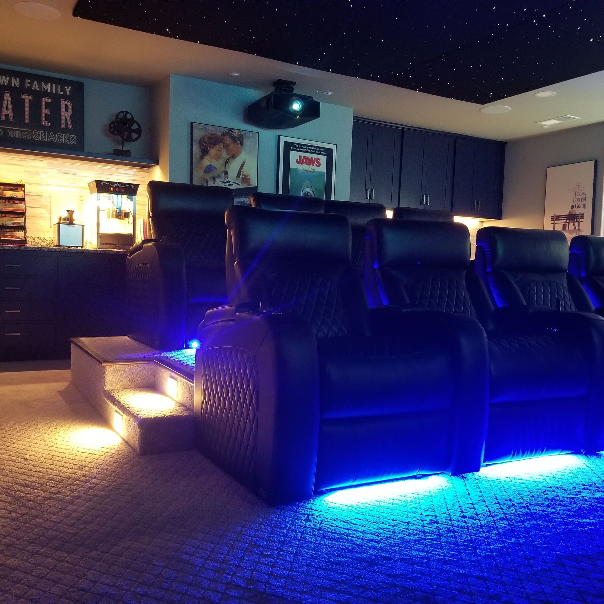 A home theater with a sign that says 