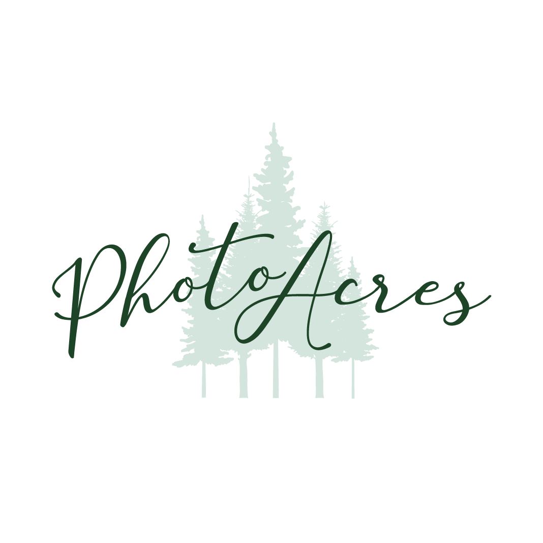 A logo for a company called photo acres with trees in the background.