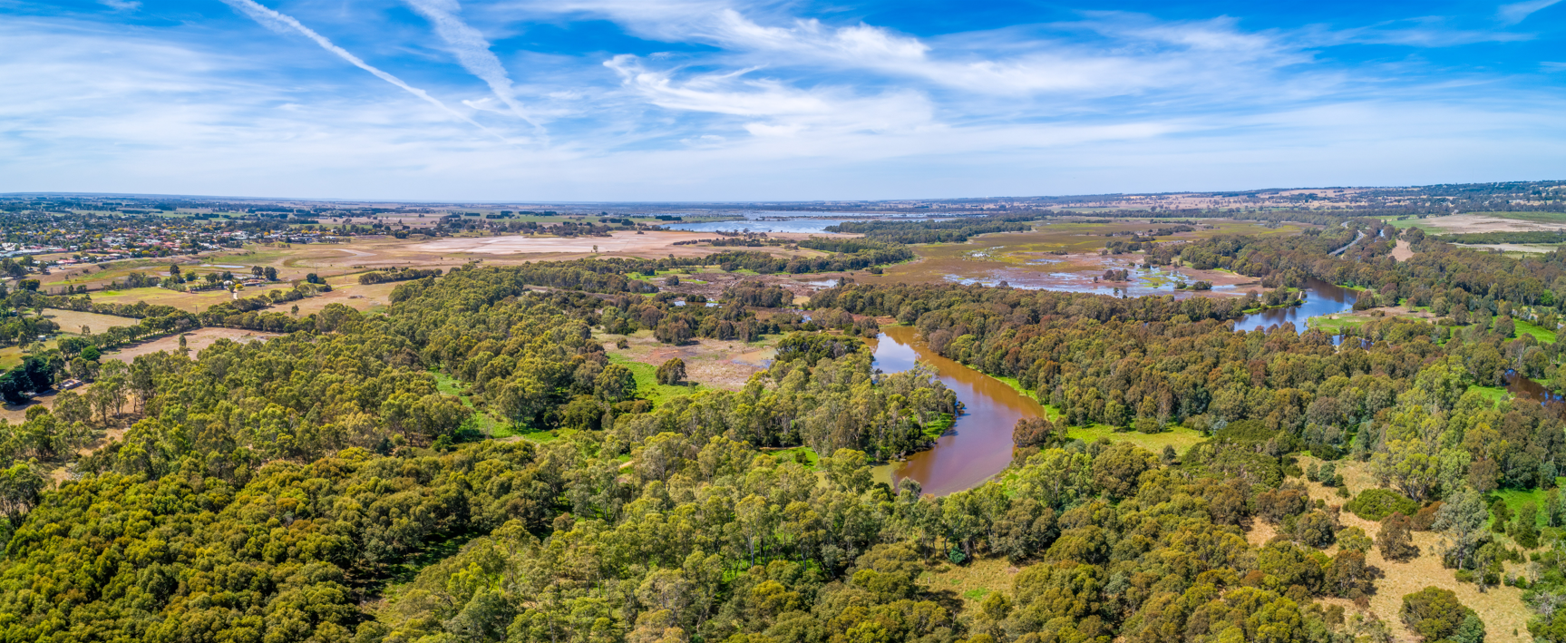 Aerial view of Thomson River and rural highway near Sale, Victoria, Australia