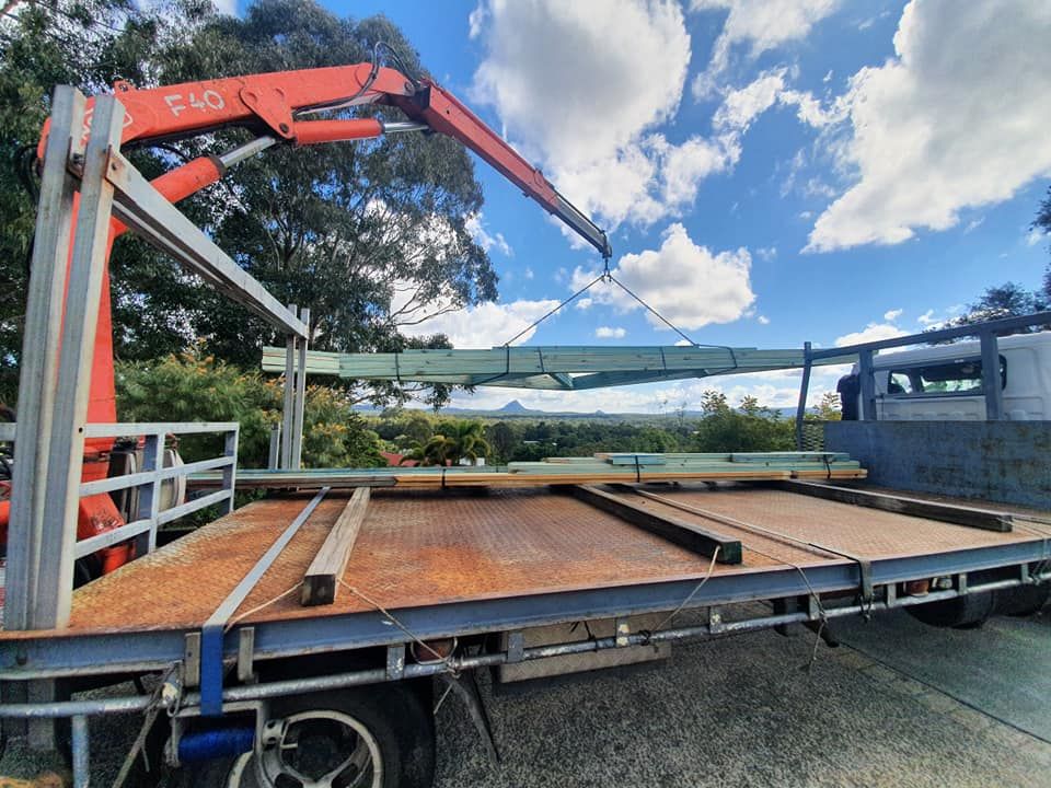 Crane truck lifting trusses. Crane truck lifting trusses.
