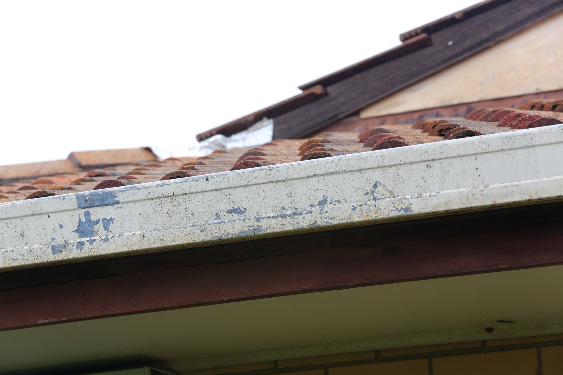 Old Roof Gutter On A House That Need Repair – Hornsby Heights, NSW - Donnelly Roof Repairs Pty Ltd