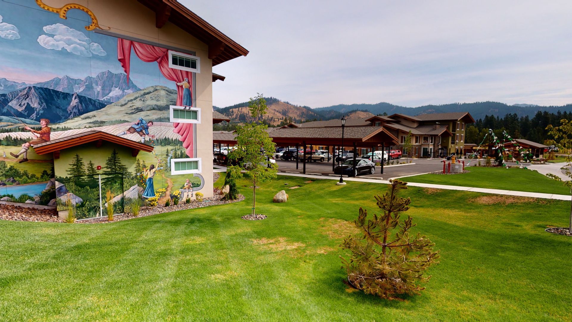 A large building with a mural on the side of it.