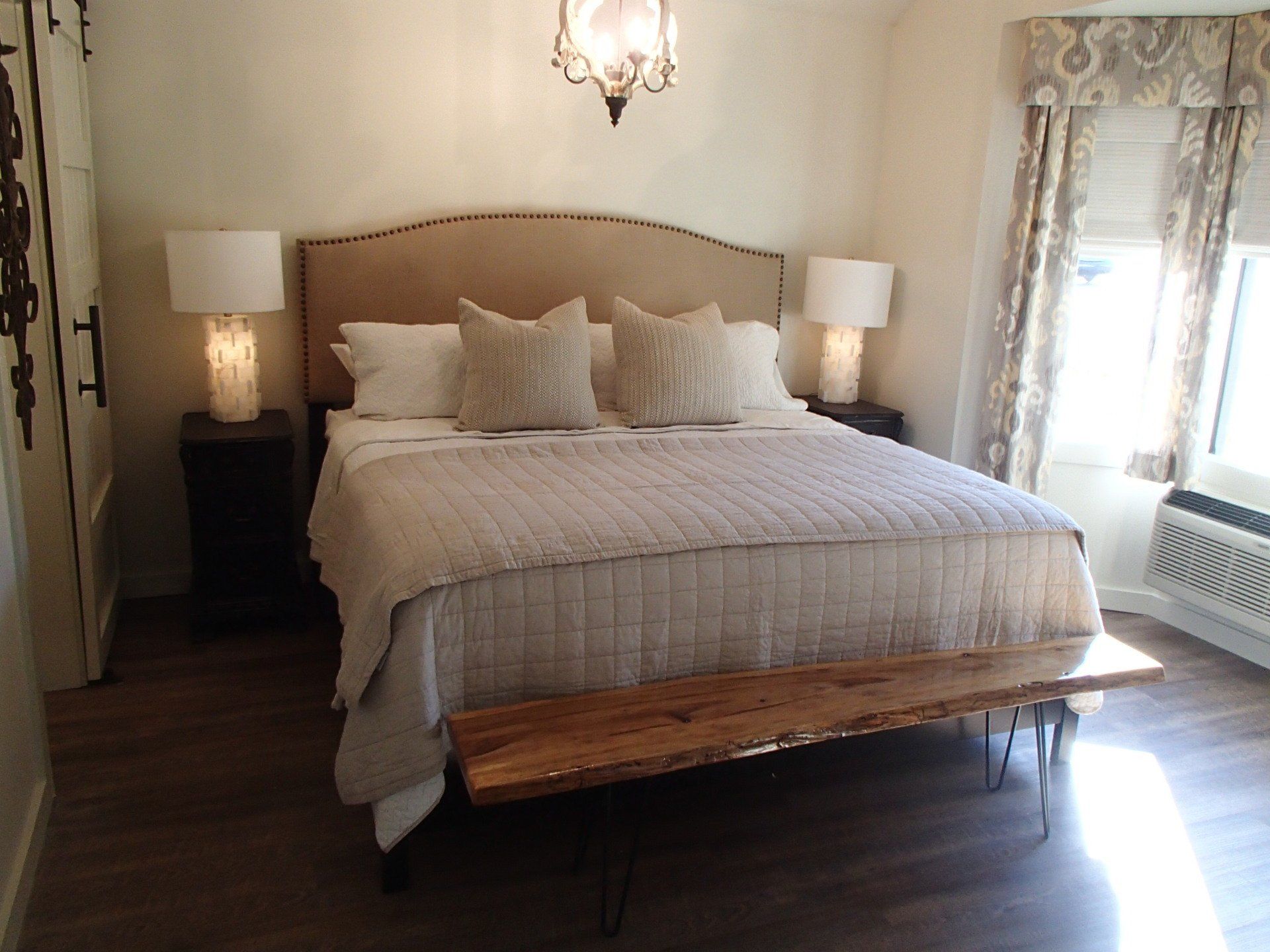 Bed in bedroom of The Big Catch suite