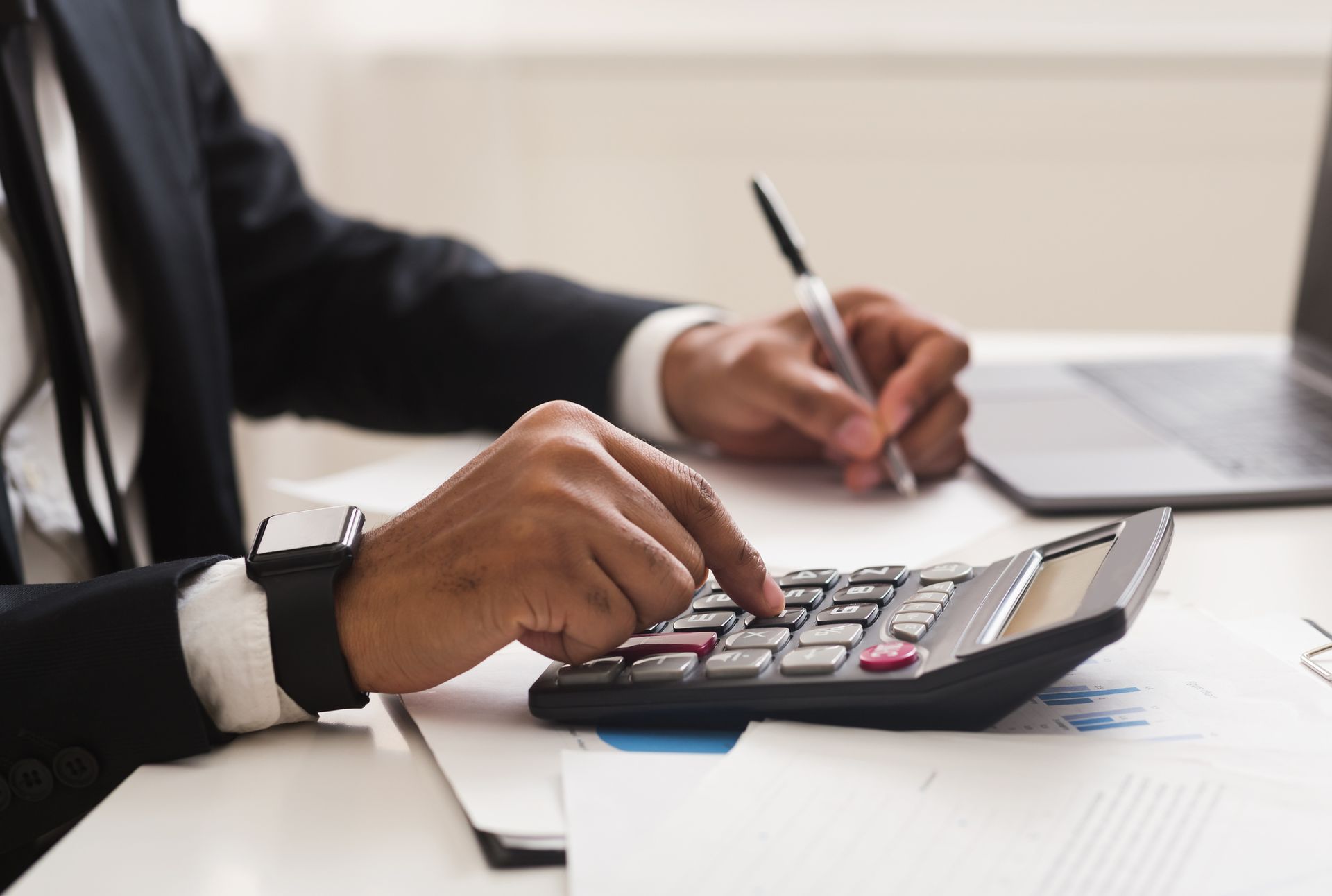 Man Calculating – Allen, TX – Keep It Simple Tax Services