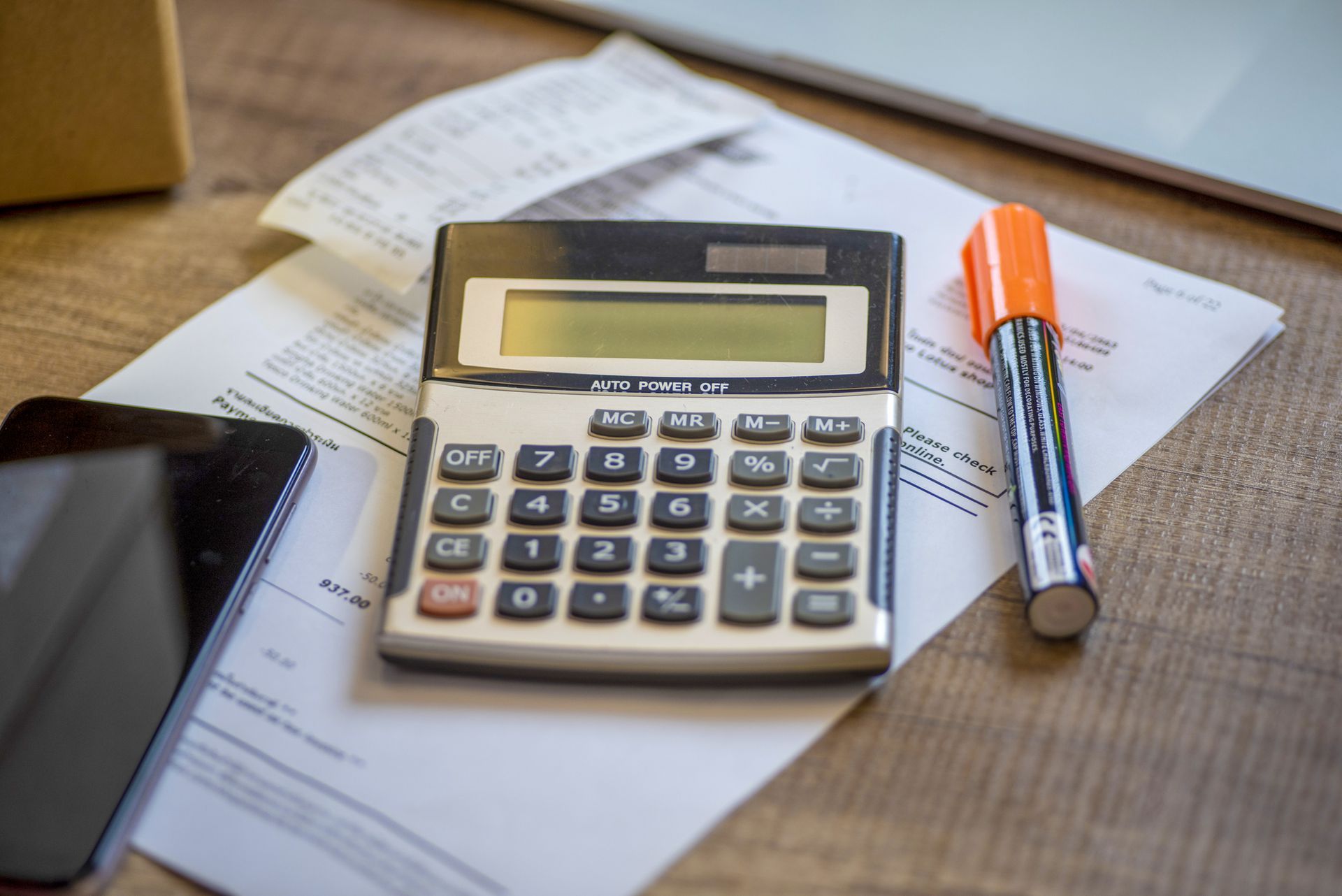 Calculator And Phone In Table – Allen, TX – Keep It Simple Tax Services