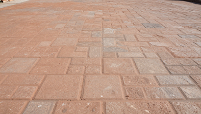 Decorative stamped concrete surface created by Concrete Services in Renton WA for enhanced curb appeal.