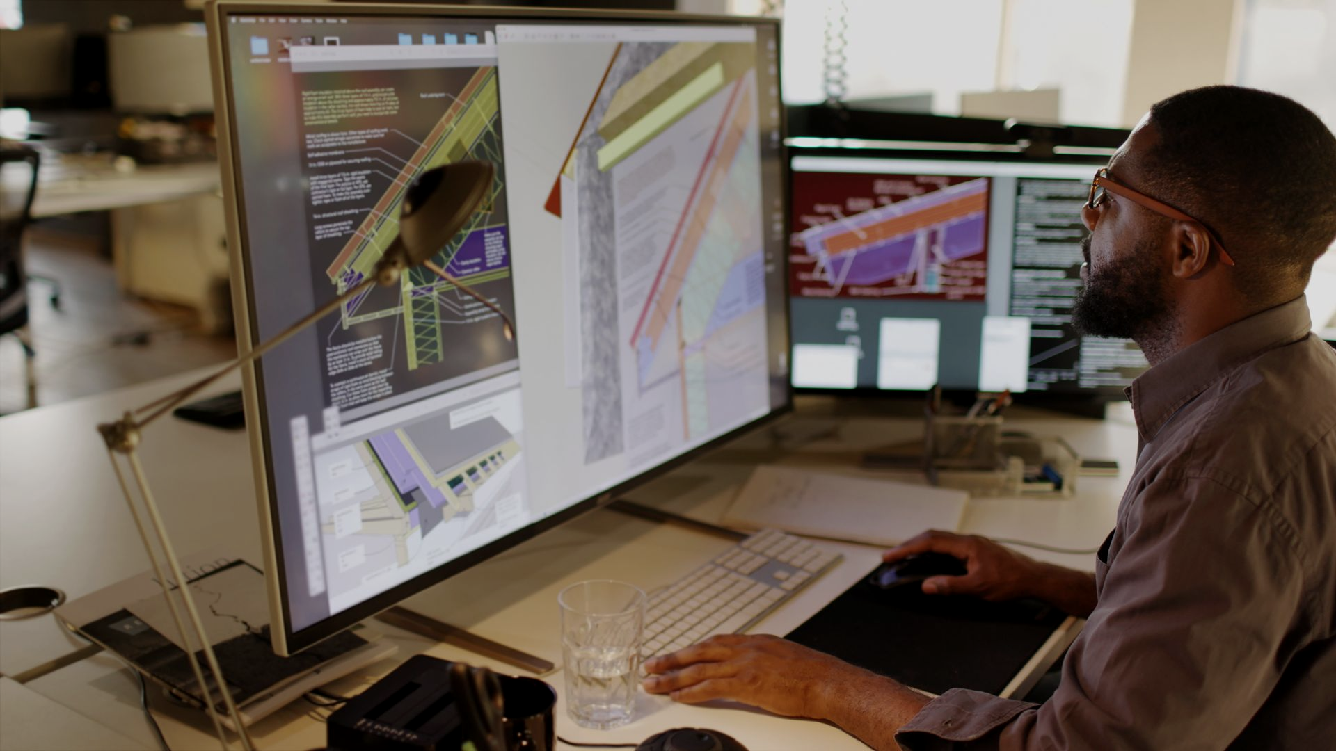 male employee working on a 3d model in a cad program