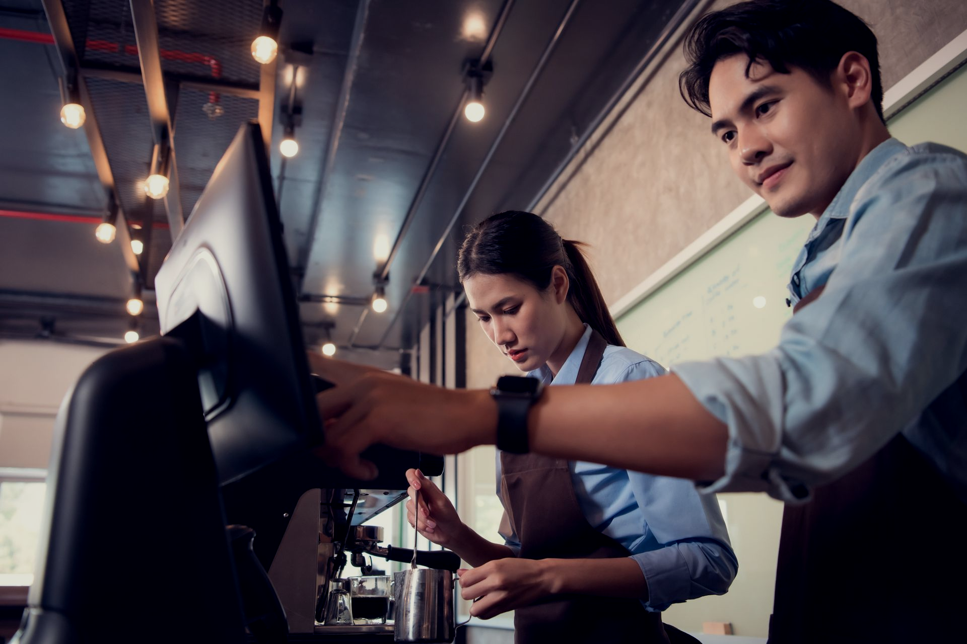 retail employees operating POS system