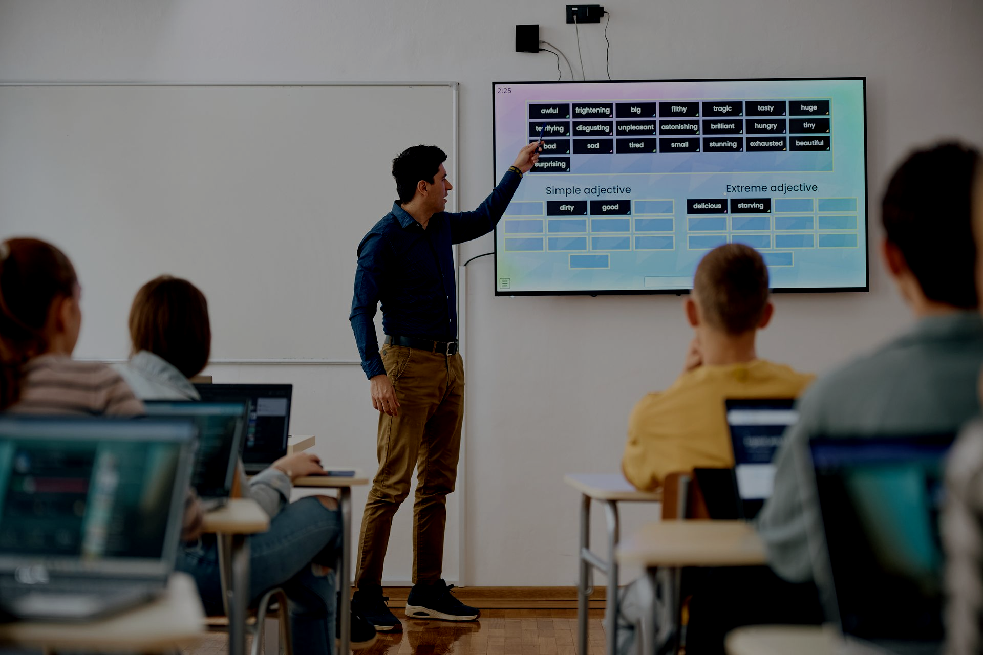 in class presentation on a tv screen during new IT training