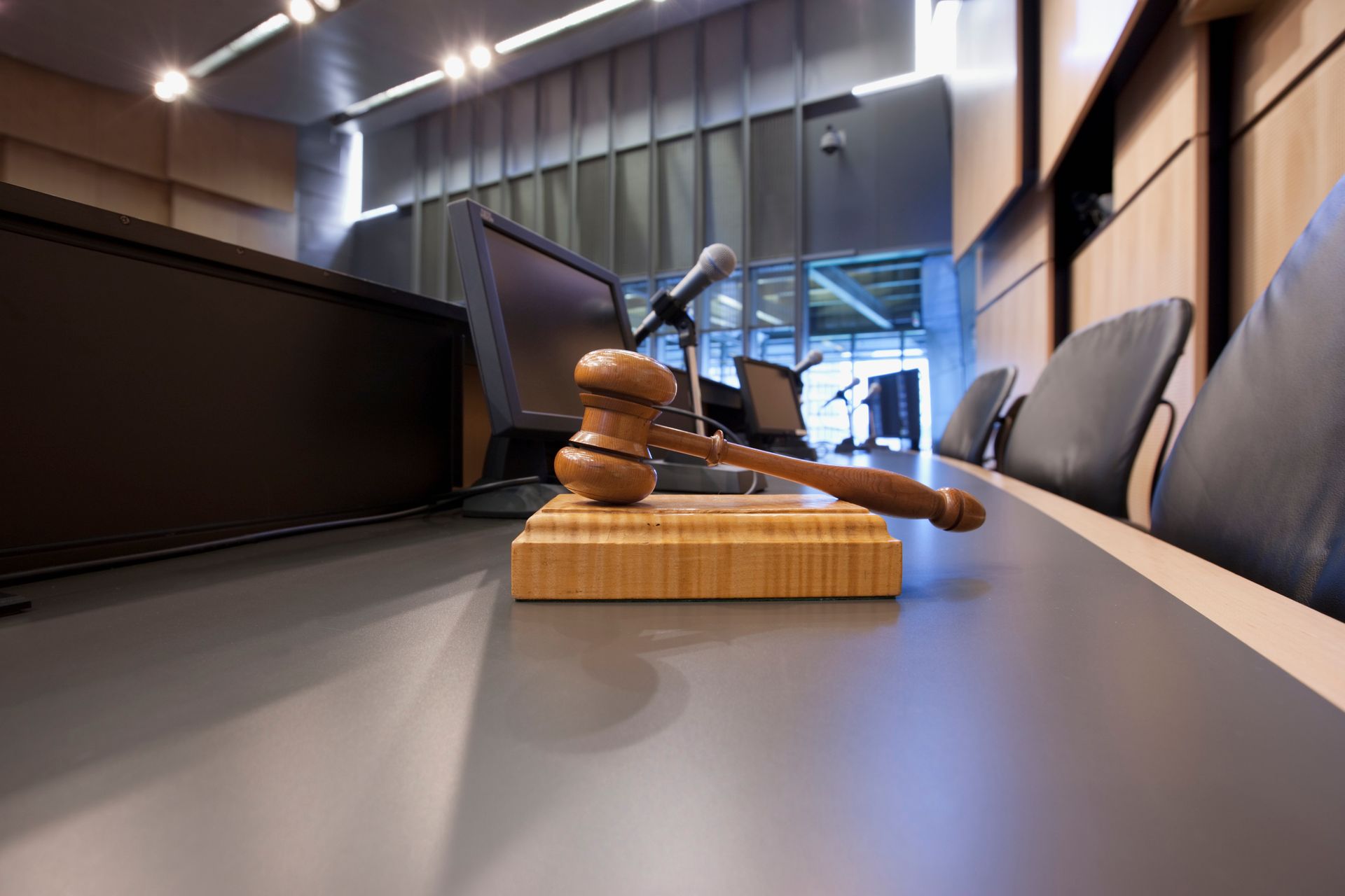 wooden gavel on a meeting table