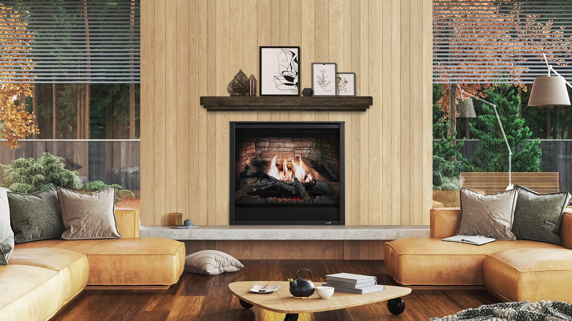 Living room with fireplace, couches, wooden paneling, artwork, and coffee table.