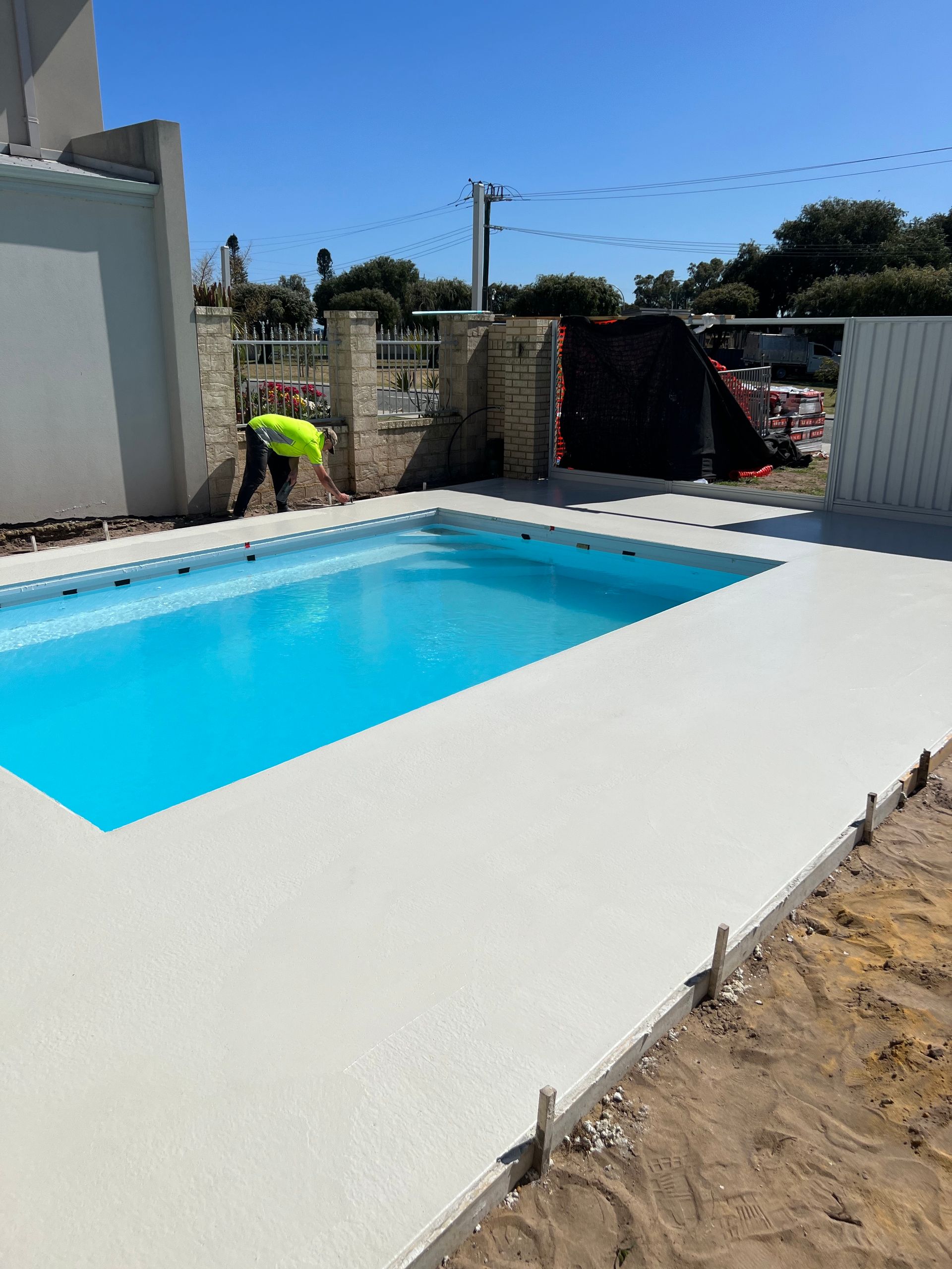 Honed concrete pool surrounds