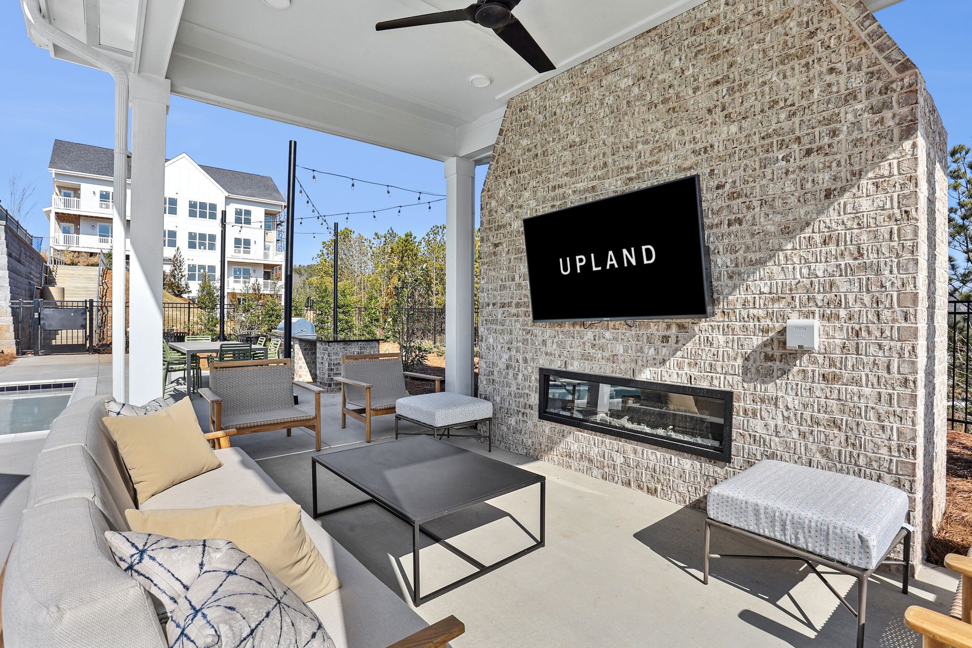 Upland at Emerson outdoor lounge seating with TV and fireplace - Cartersville, GA