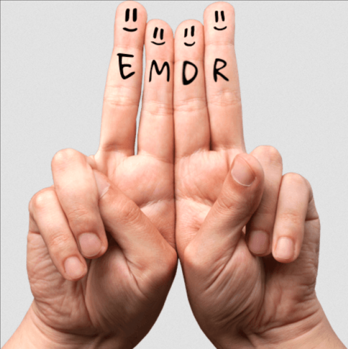 La parola emdr è scritta sulle dita di una persona