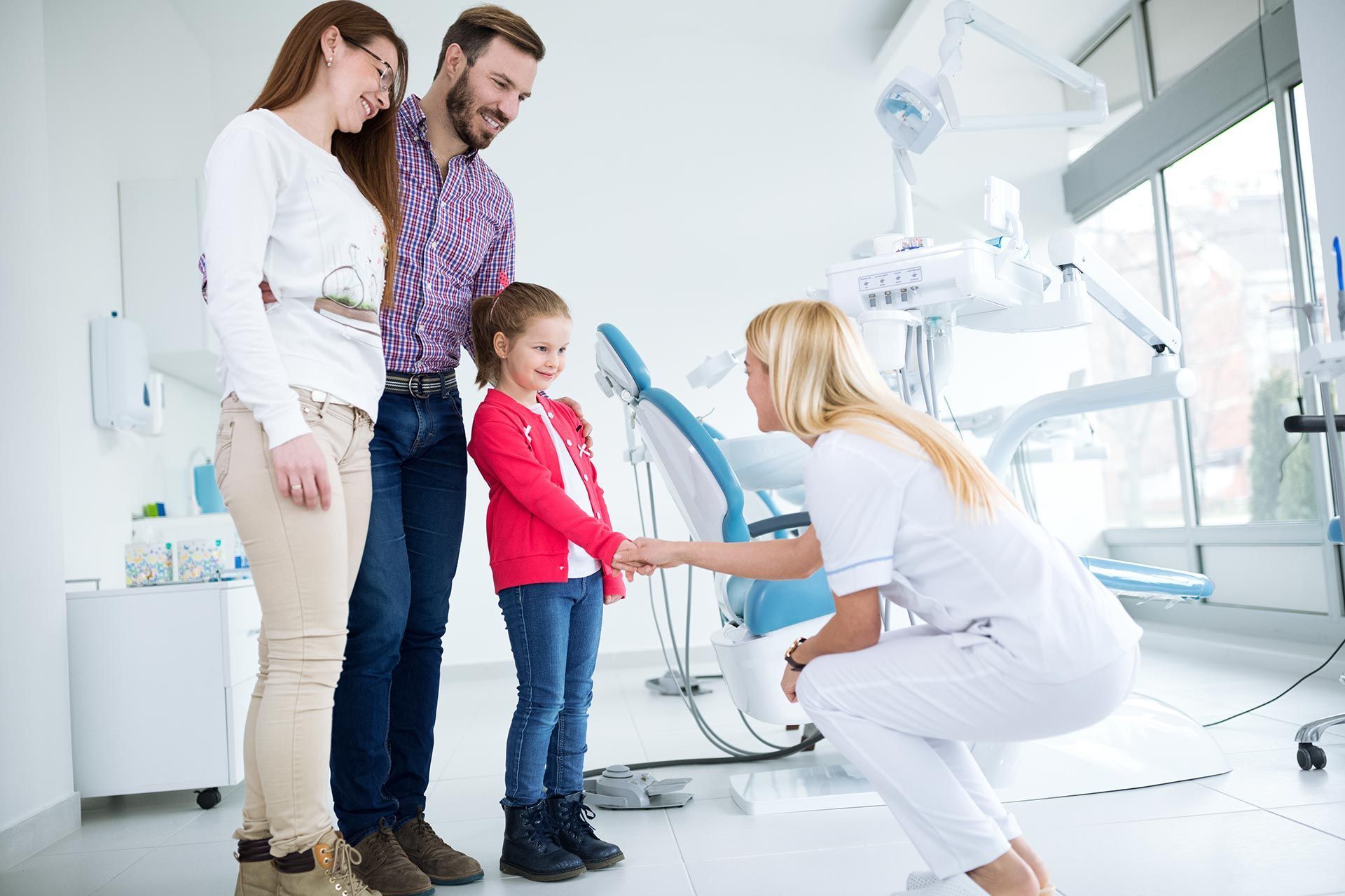 Family visits the dentist in the dental office. Family visits the dentist in the dental office.