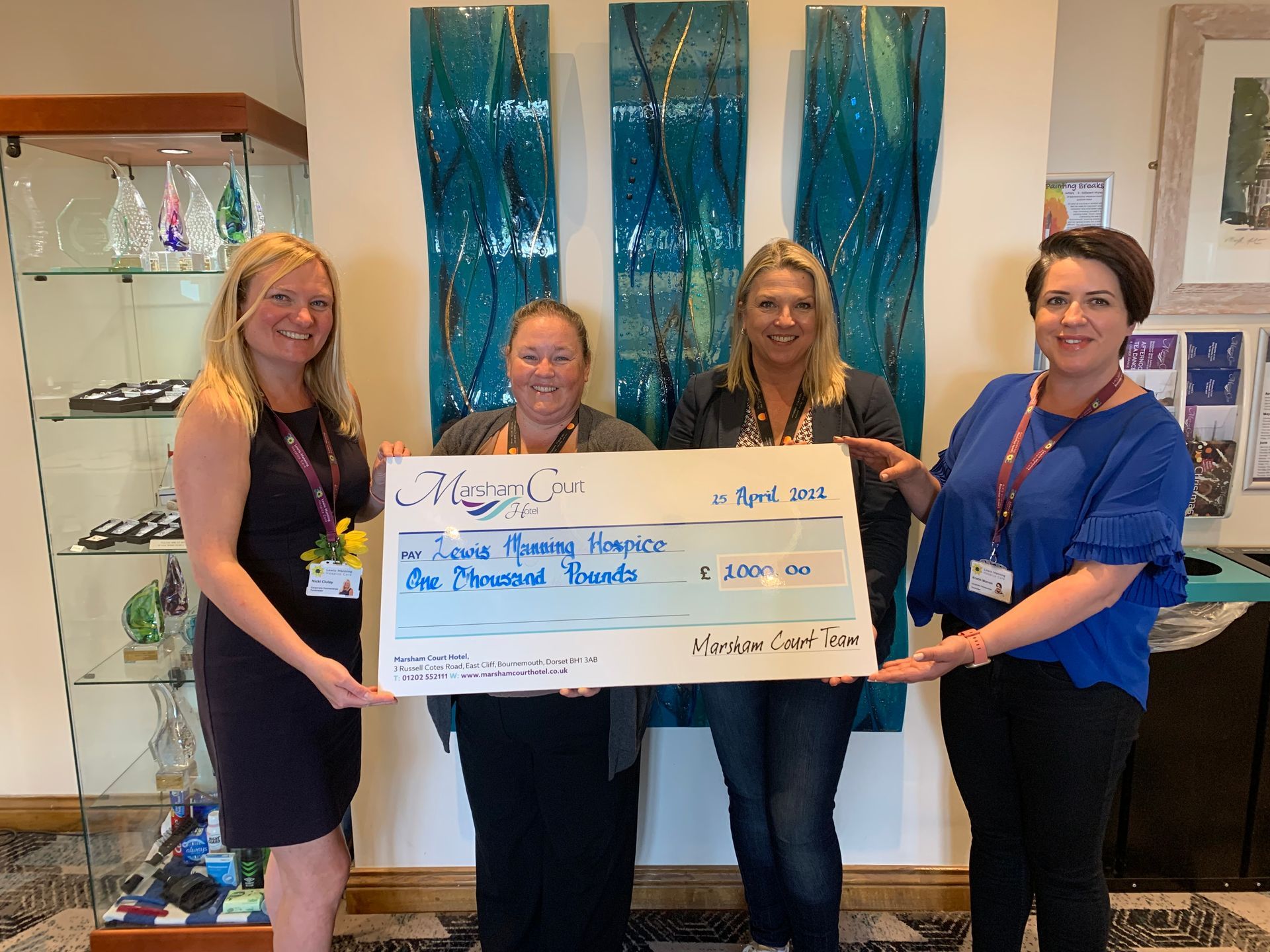 Cheque presented to the Lewis Manning Hospice in the foyer of the Marsham Court Hotel