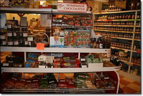 A store with a sign that says homemade chocoladen