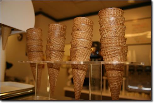 A bunch of ice cream cones stacked on top of each other