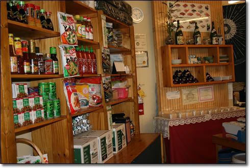 A store filled with shelves filled with lots of food items