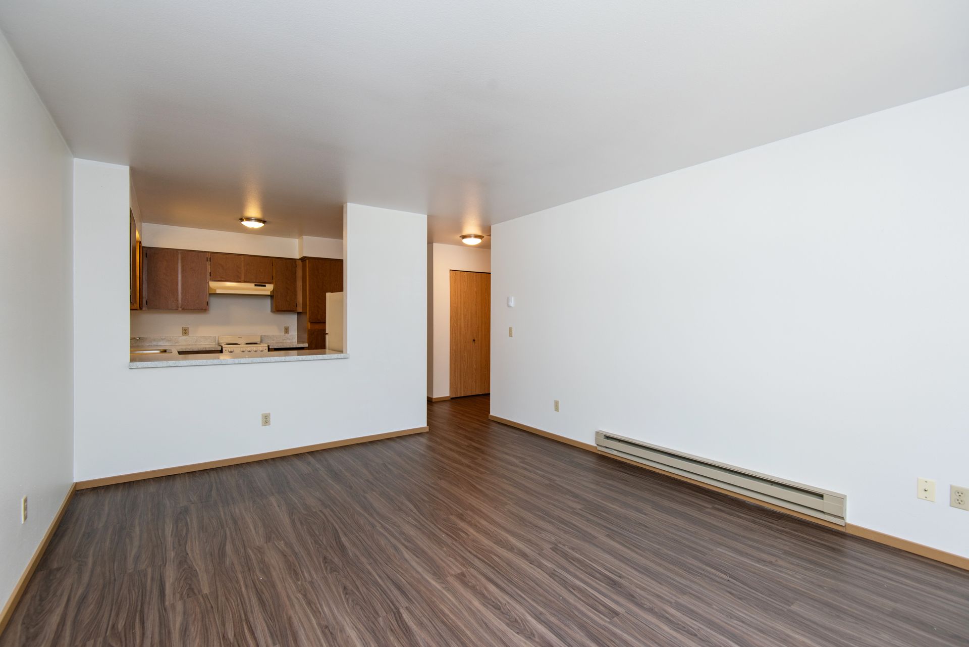 Living room with view of kitchen