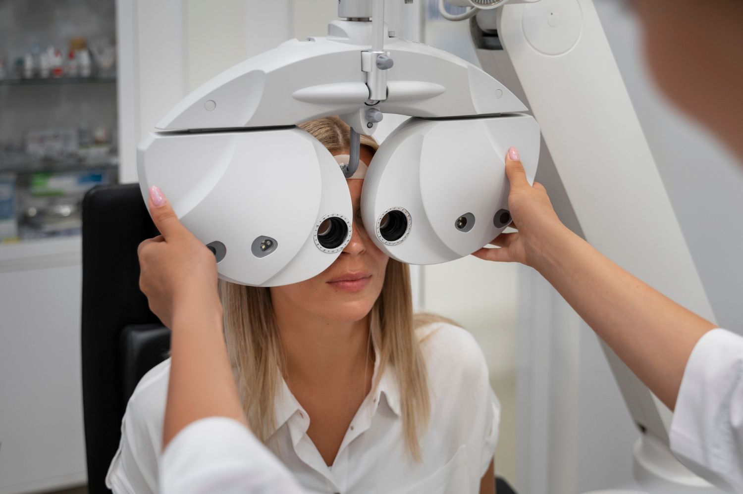 Eye exam with doctor and patient at a slit lamp in a bright clinic