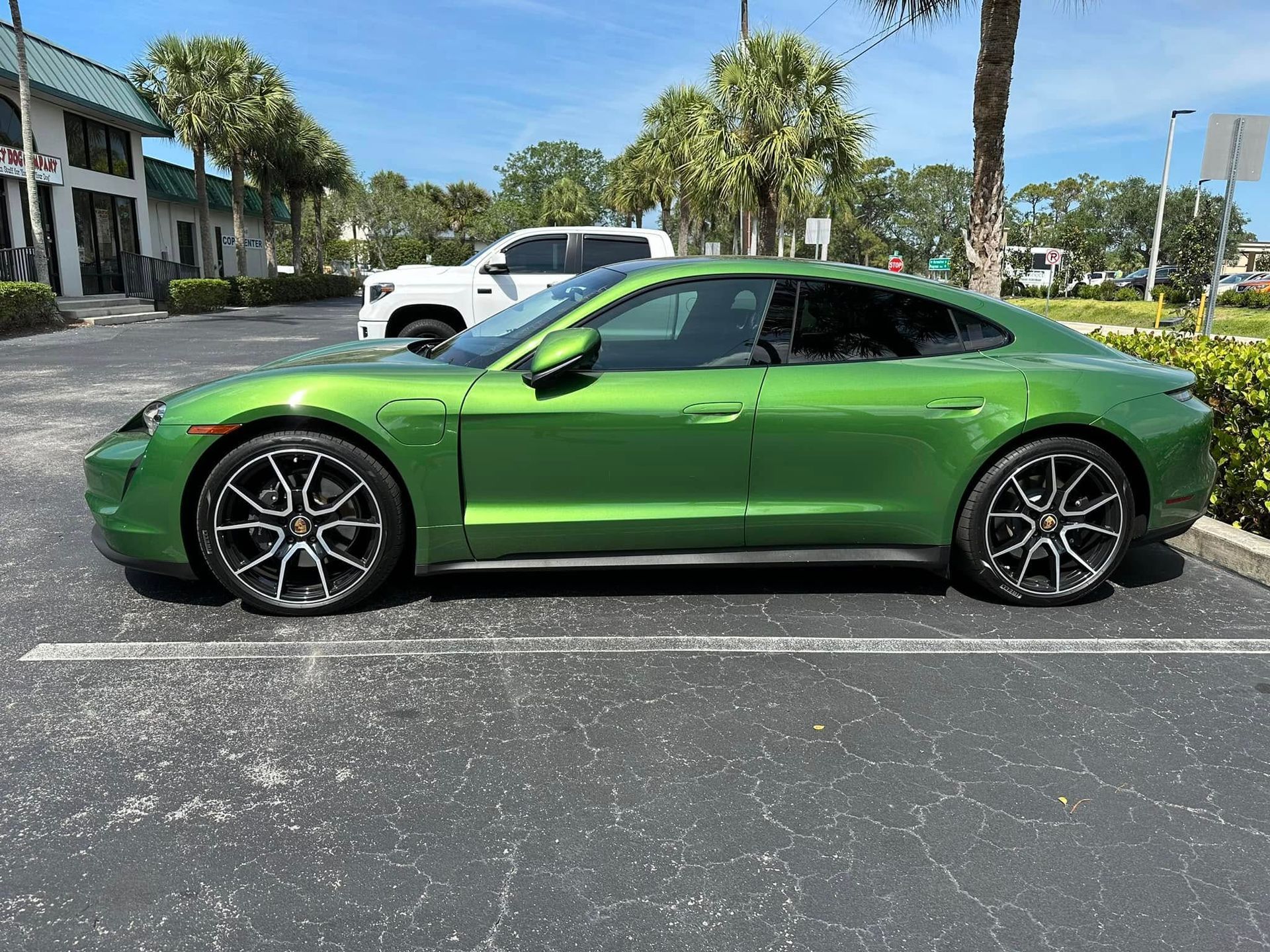 Green Ford Mustang with tinted side windows