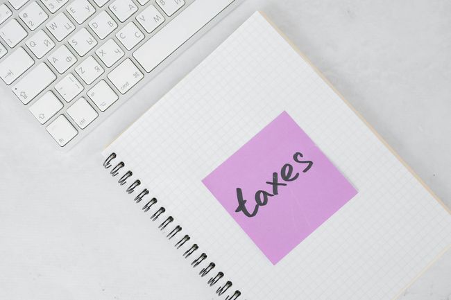 White keyboard and notebook with a