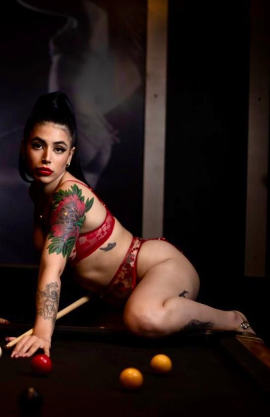 Sexy Woman Wearing Red Bikini On Top Of Billiard Table — After Dark Gentlemens Club In Geelong, VIC