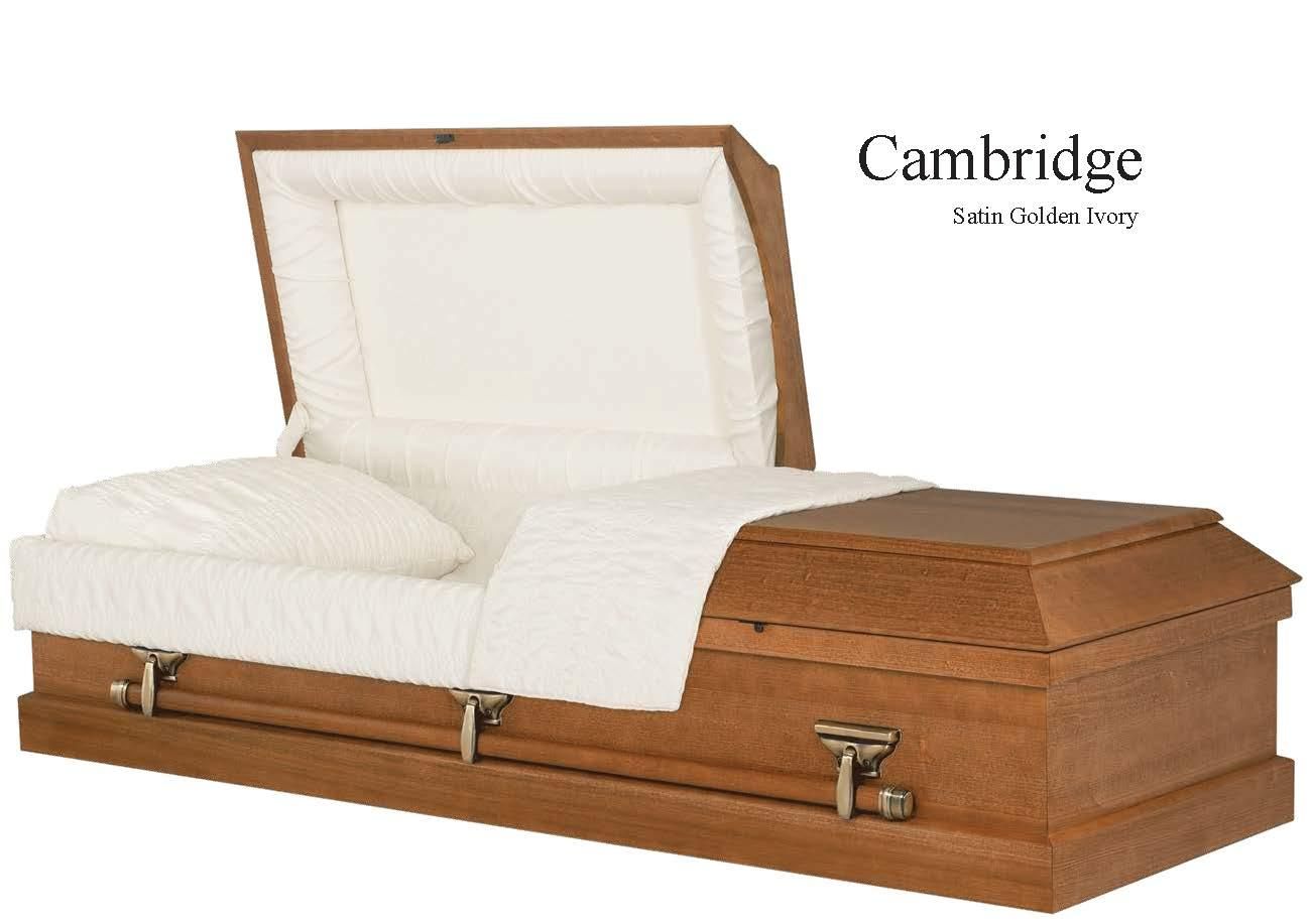 White upholstered coffin with open lid and wood base, labeled Cambridge, on a white background