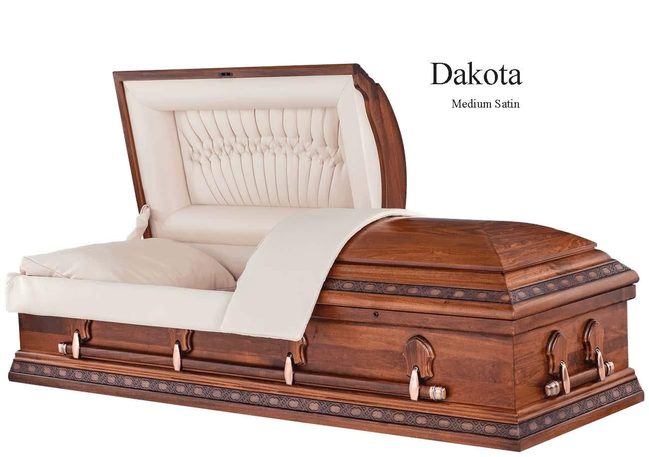 Open walnut-brown coffin with cream satin lining and pillow