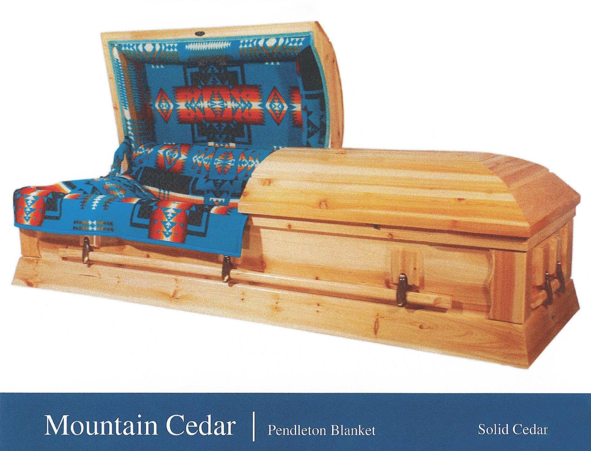 Blue-lined cedar coffin with open lid showing a quilted blue interior