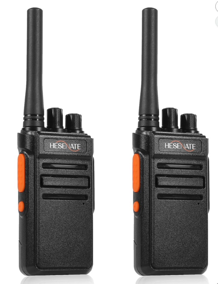 Two black two-way handheld radios with orange side buttons and antennas, positioned side by side against a white background.