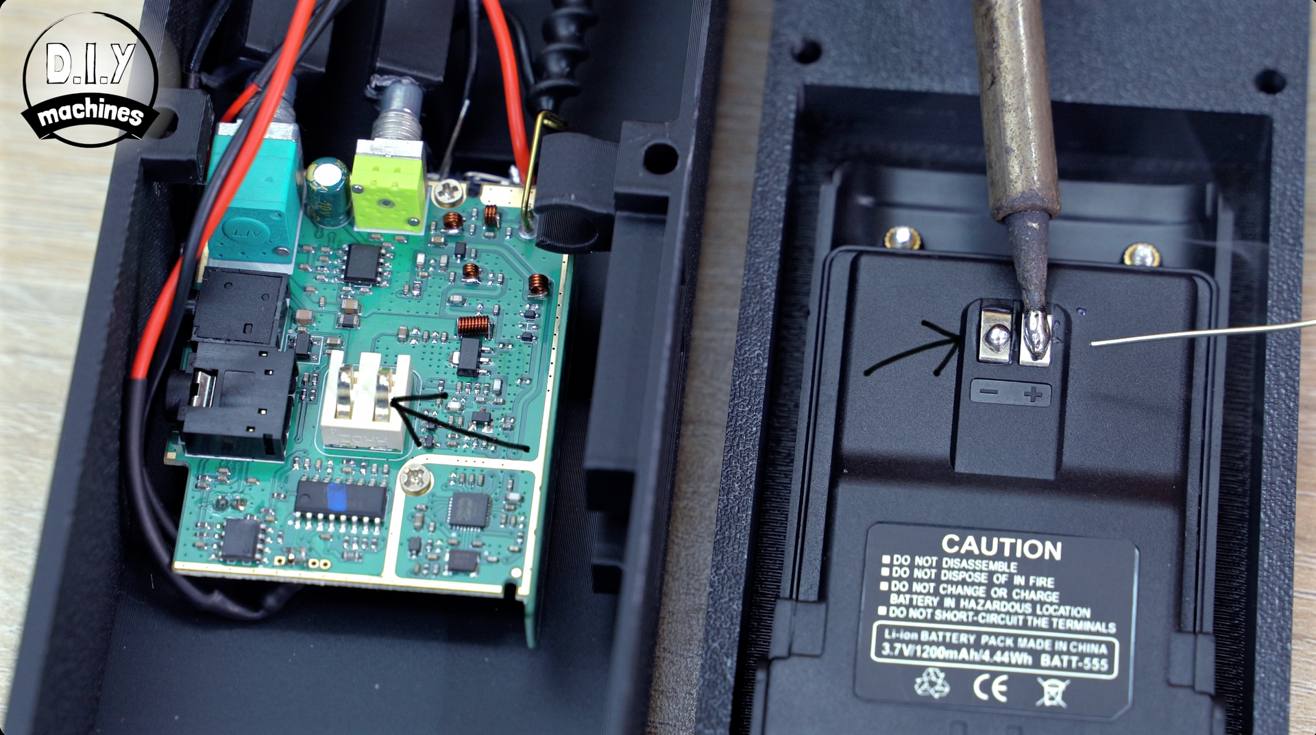 A soldering iron tip is shown working on two small metal terminals inside a black plastic device casing.