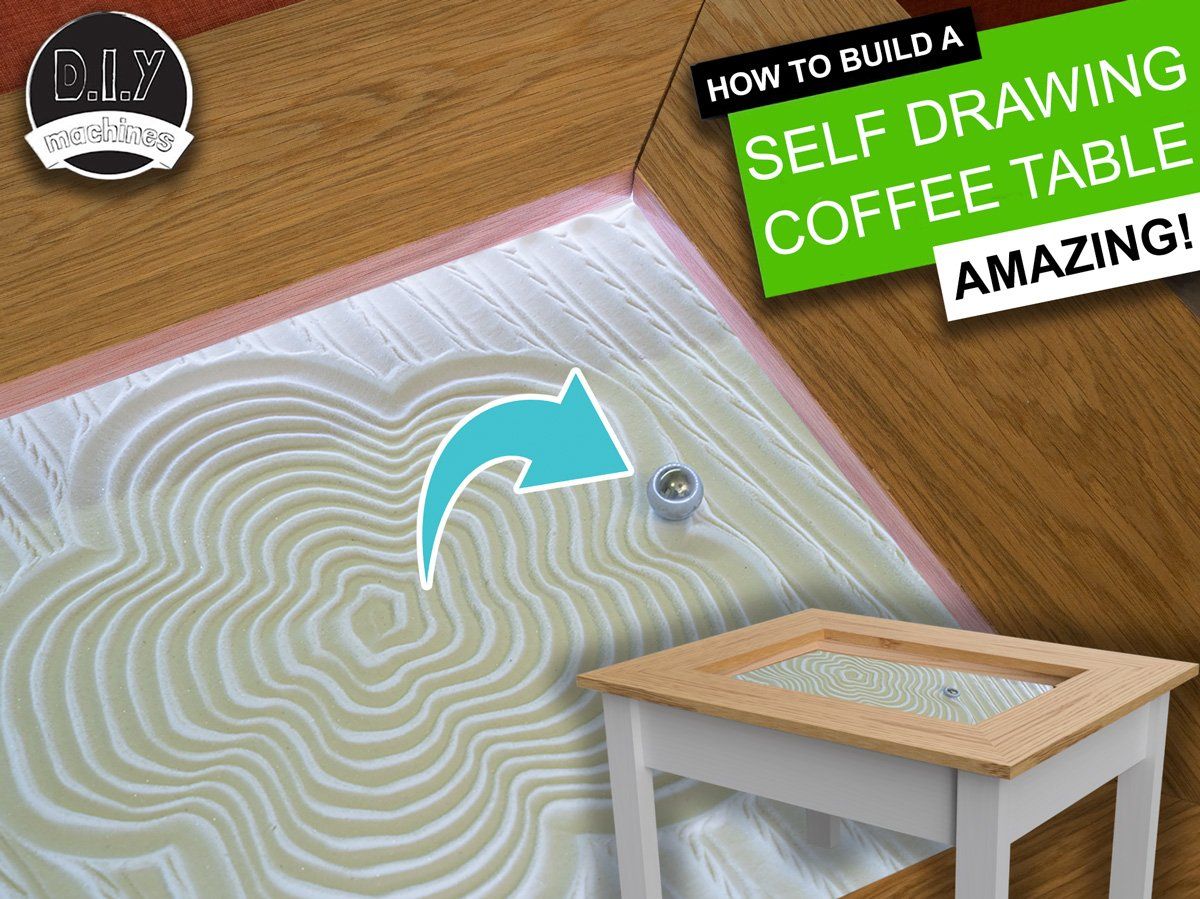 A DIY coffee table with a sand-filled top and a metal ball drawing intricate, self-made patterns inside.
