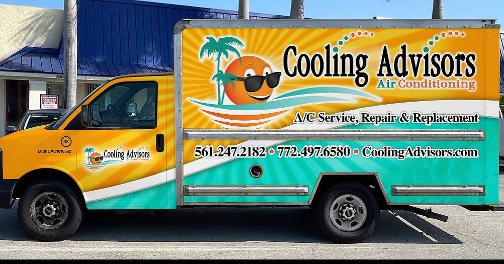 Yellow and blue box truck with