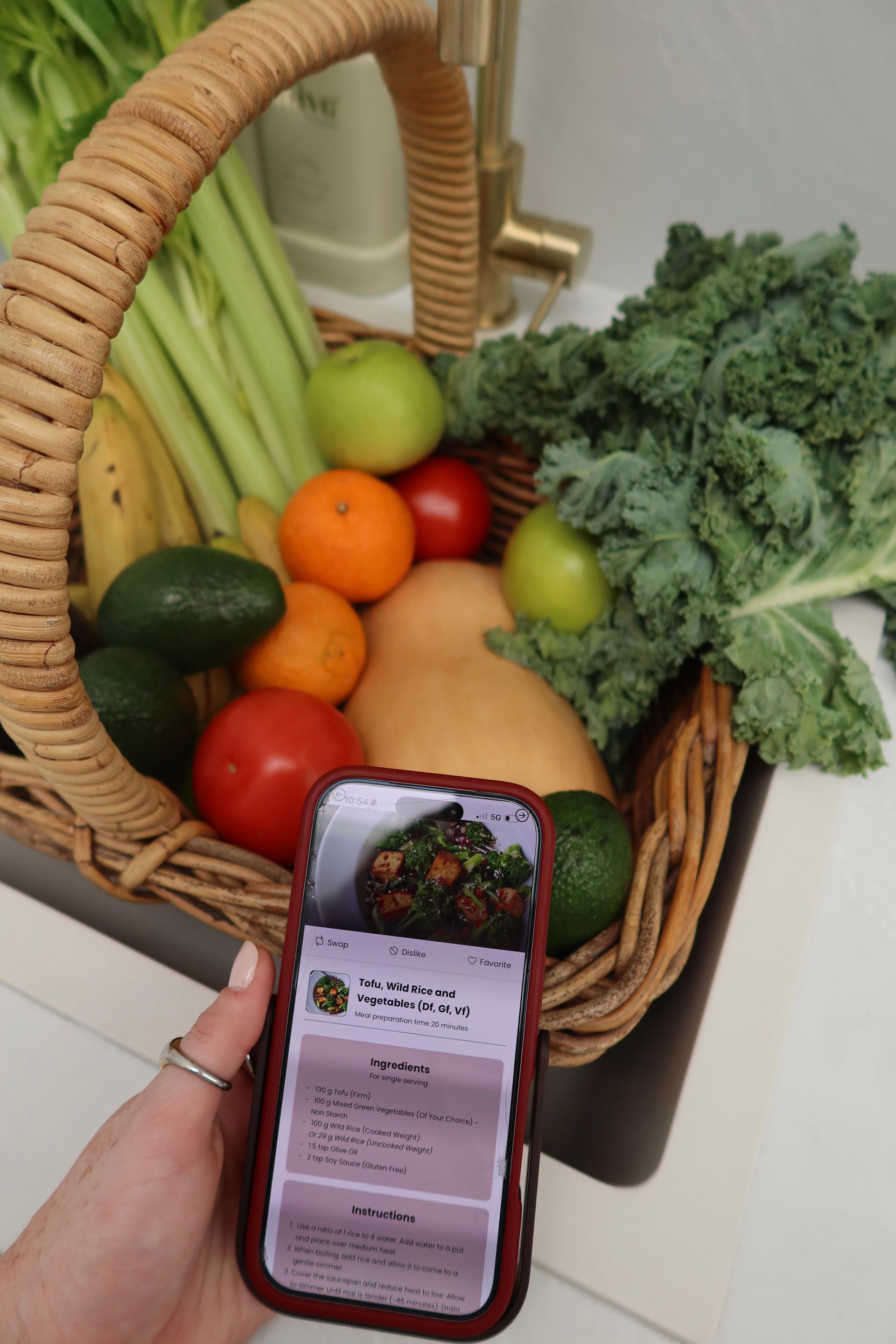 The DJM app in hand