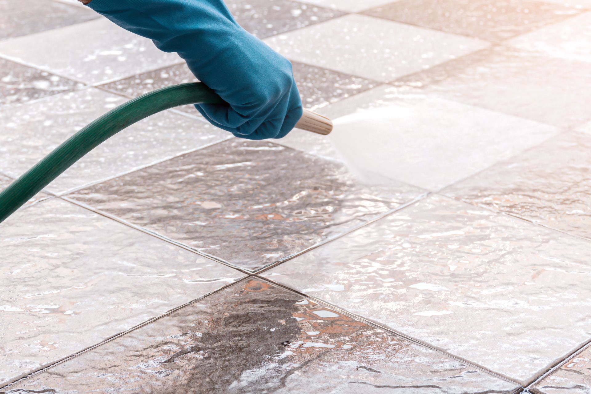 Cleaning Tile Floor With a Hose