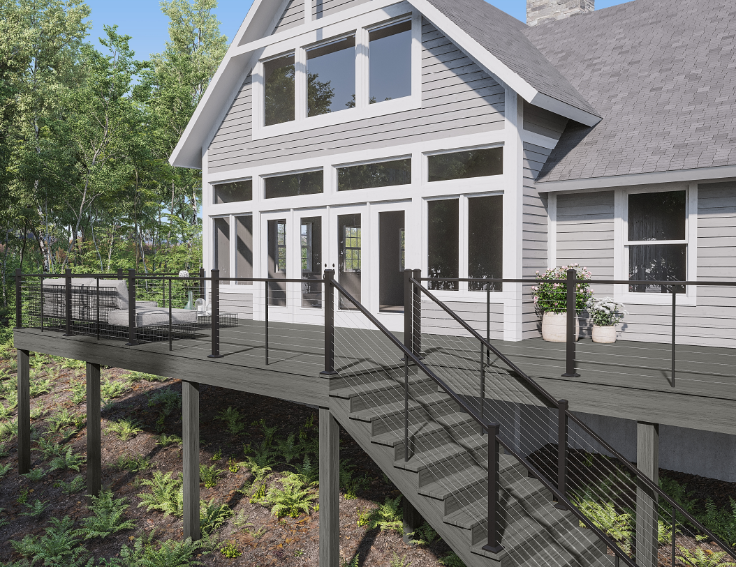 Gray house with a deck and black railing. Steps lead up to the deck.