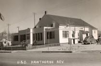 A black and white photo of a building in hawthorne nevada.