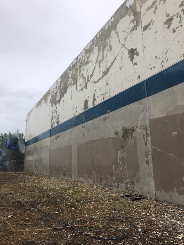 Commercial building pressure washing after removing
