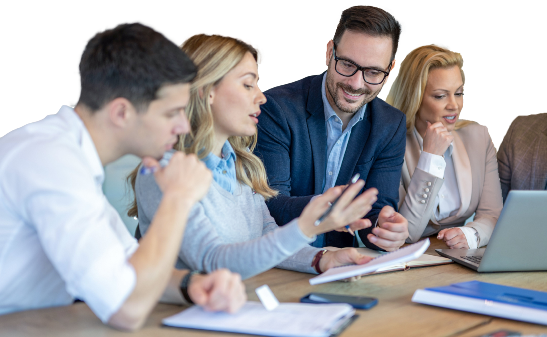 A group of people are sitting around a table having a meeting.
