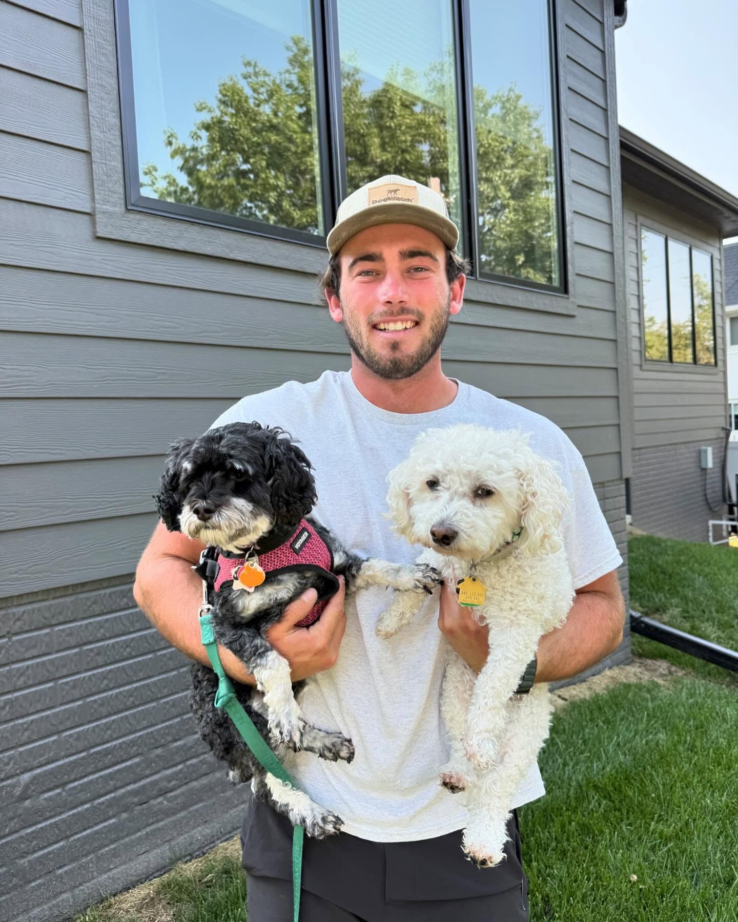 Earl Outdoor Solutions DogWatch dealer Jack with customers' dogs in Omaha