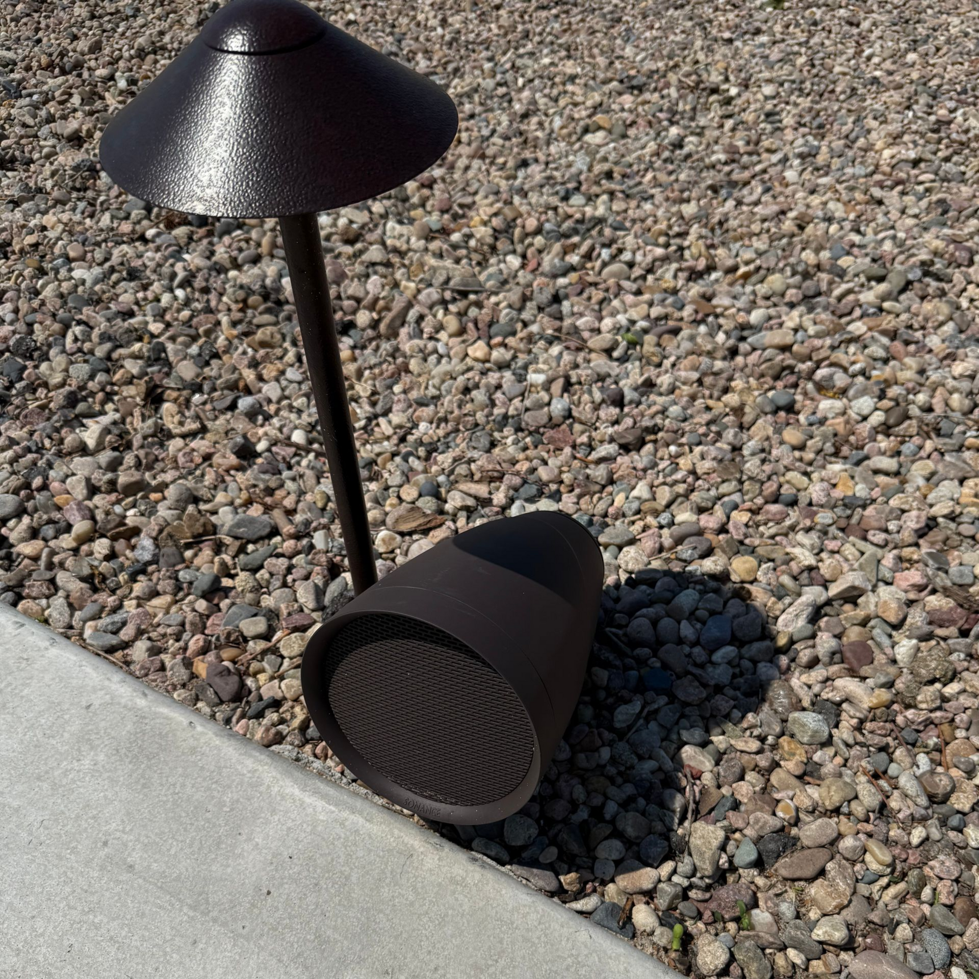 Integrated landscape lighting and outdoor speaker fixture — Earl Outdoor Solutions Omaha