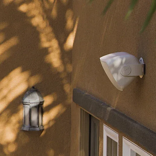 Sonance Mariner outdoor speaker mounted on exterior wall — Earl Outdoor Solutions Omaha