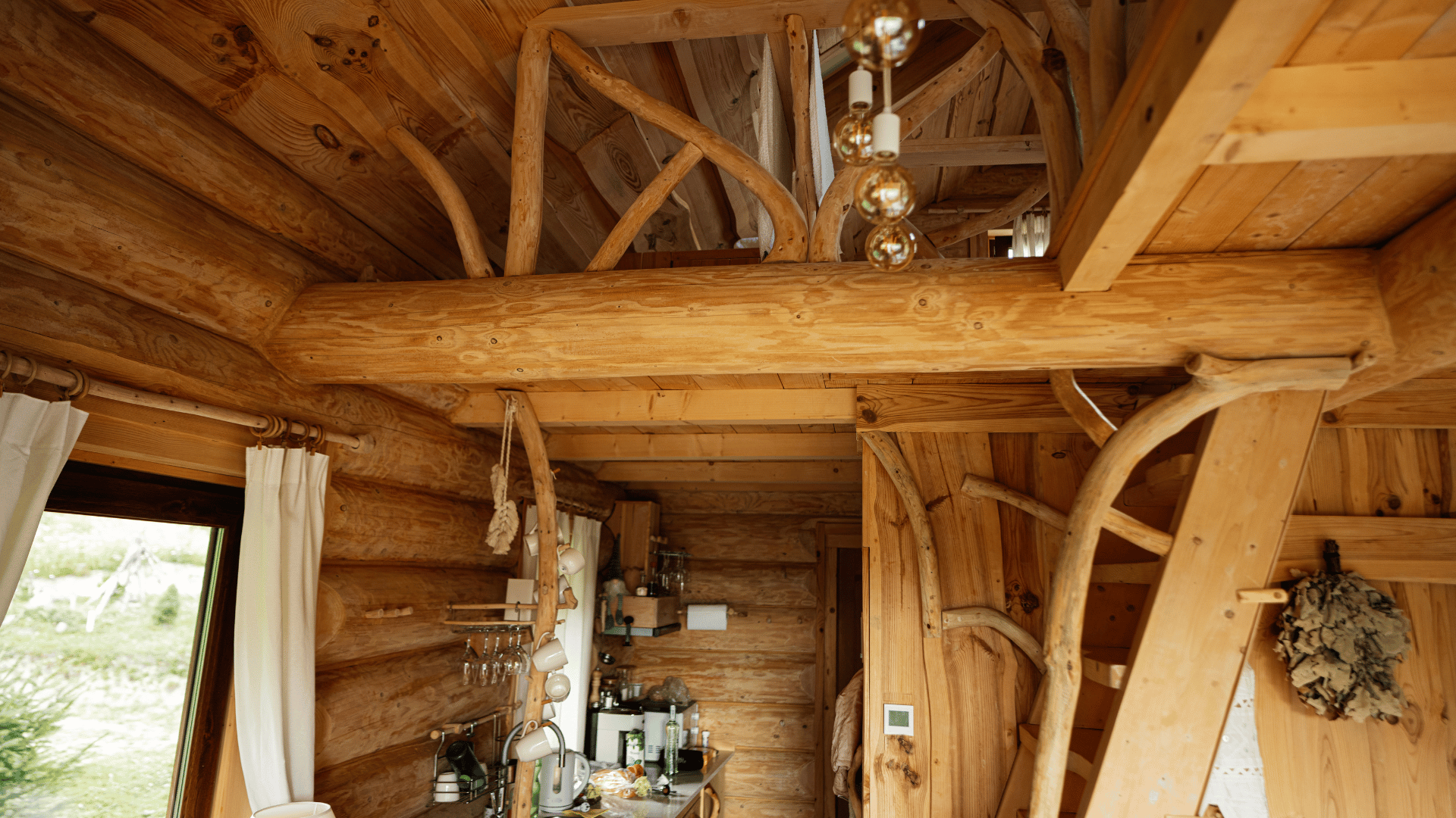Custom built cabin with porch and loft designed for recreational living and guest accommodations