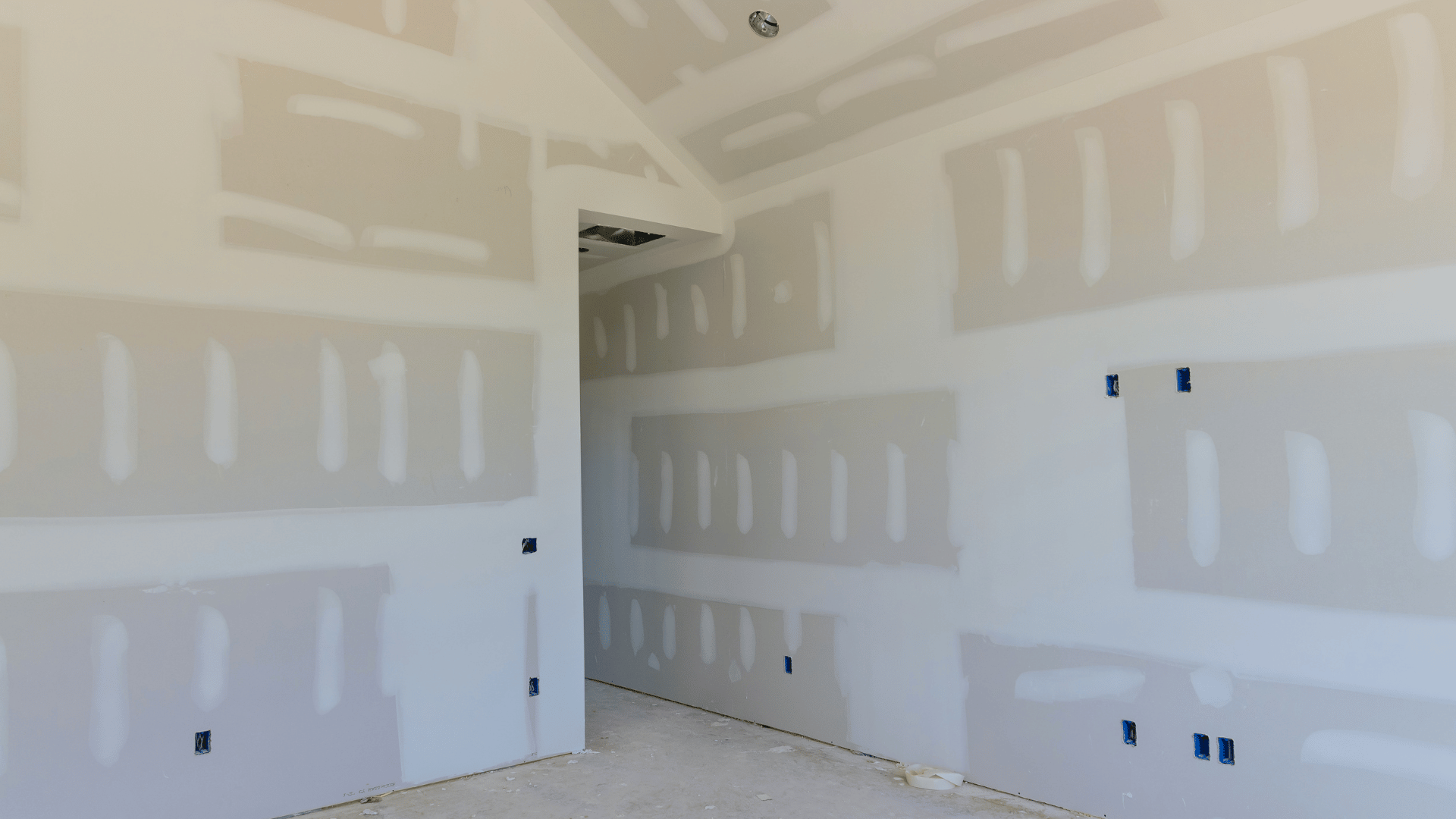 Prefabricated cabin with unfinished shell and utility-ready interior for custom completion